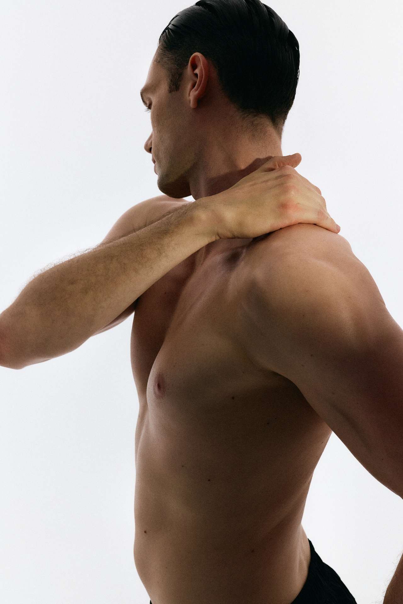Morning Ritual Kit — athlete releasing tension in neck and shoulder